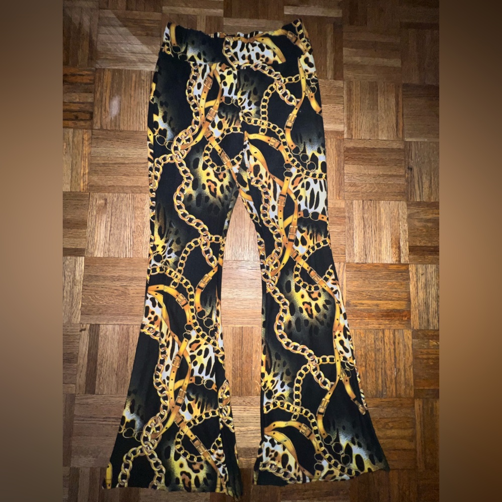 No Boundaries Animal Print and gold chain Flare Pants
